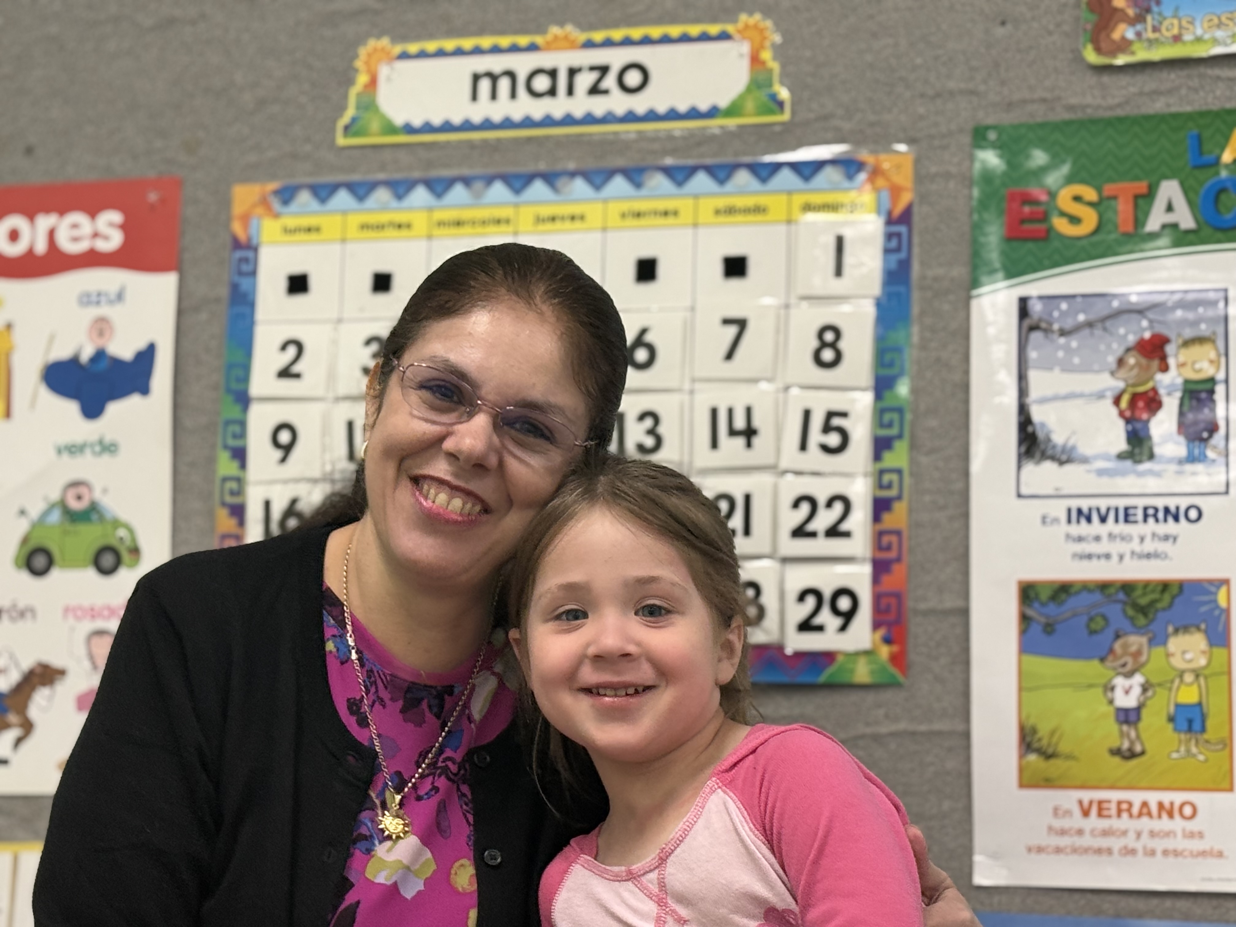 Teacher and child in Spanish class
